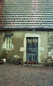 Typical French town house with damp walls